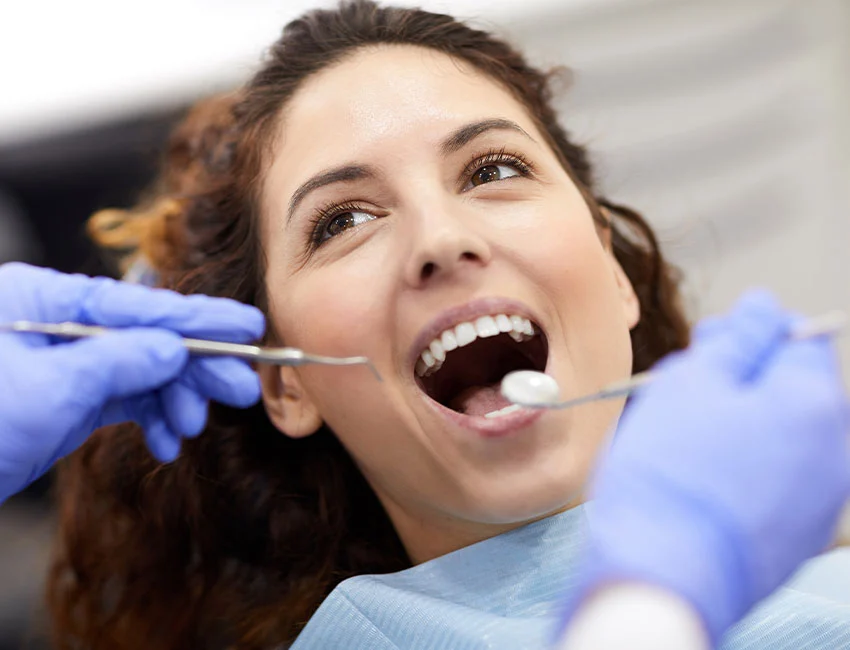 Patient getting teeth cleaning at Gardena Dental Group