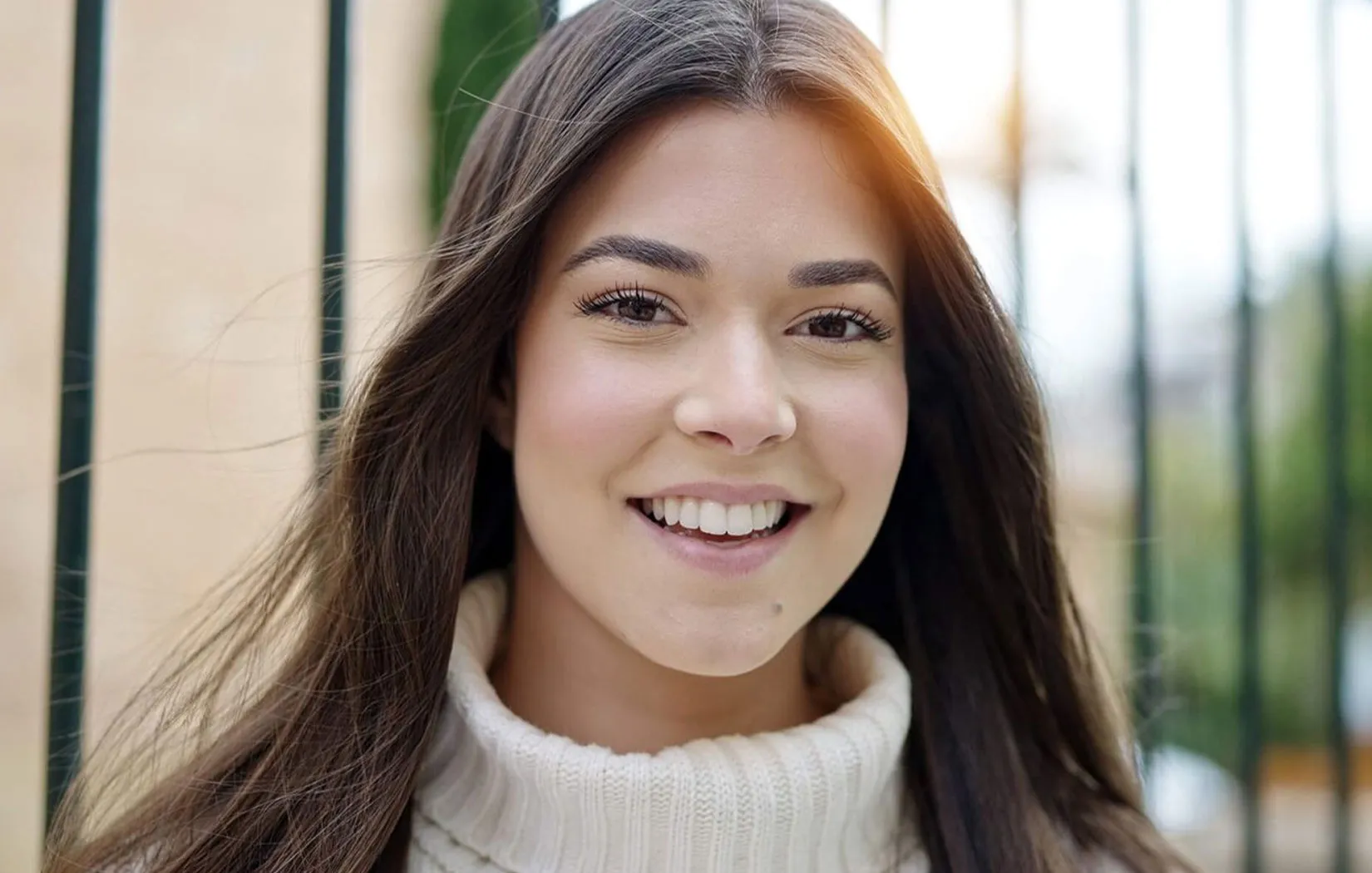 Female beautiful smile makeover with dental veneers