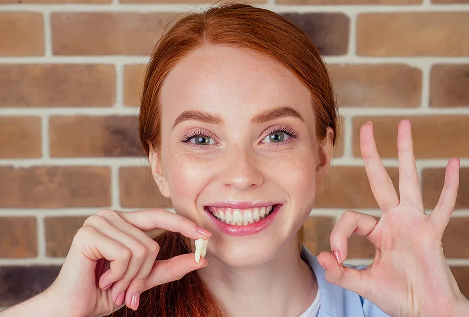 woman with tooth